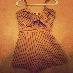 Japna peekaboo tie romper. Worn once. Size small